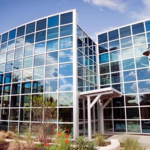 Exterior View of Curtain Wall System with Various Colored Solarban Glass | Town Lake YMCA | Commercial Projects | Anchor-Ventana