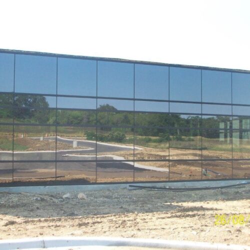 Exterior View of Glass Curtain Wall System with SSG Verticals | STAR Park at Texas State University | Commercial Projects | Anchor-Ventana