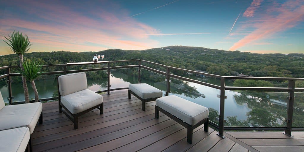 Elegant glass railings overlooking a scenic view | faq