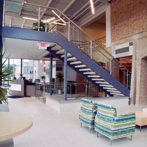 Interior View of Glass Handrail on Staircase | Town Lake YMCA | Commercial Projects | Anchor-Ventana