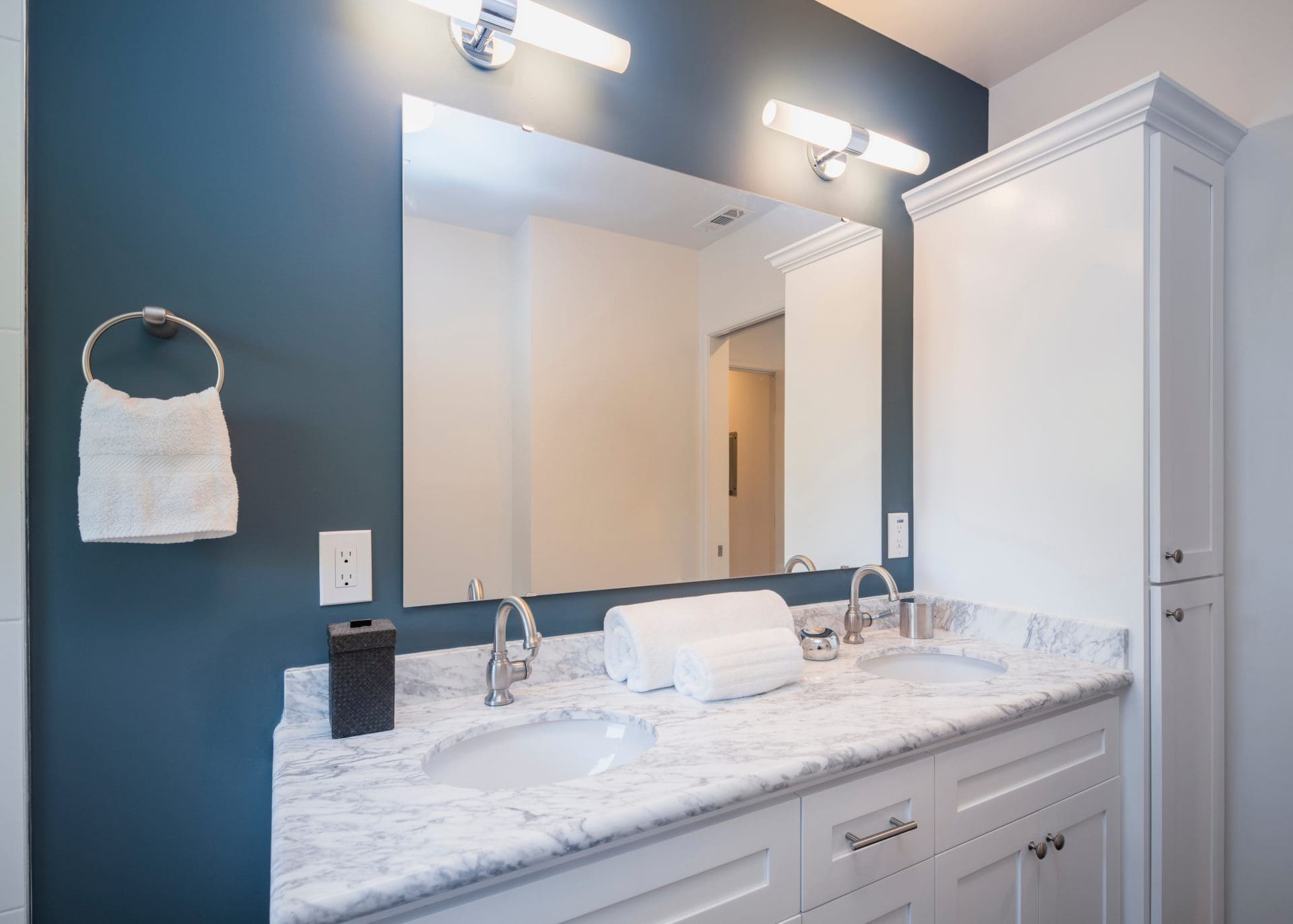 a Frameless mirrors in a bathroom