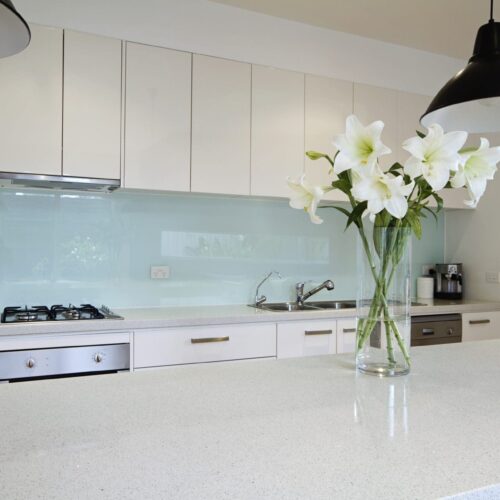 back painted glass light blue glass in white kitchen