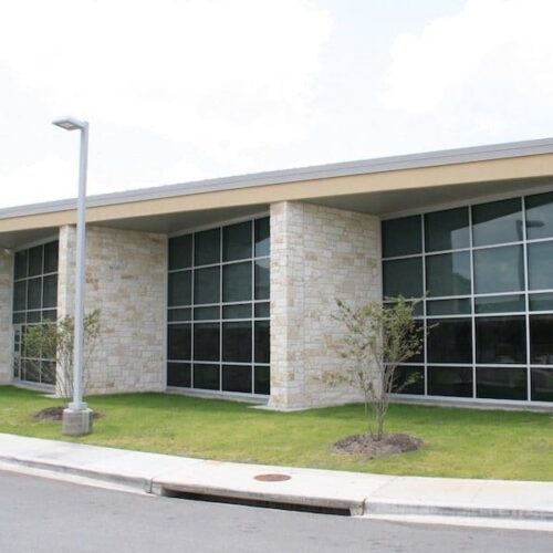 Exterior View of Glass Curtain Wall Systems on Side of Building | Lake Travis Middle School | Commercial Projects | Anchor-Ventana