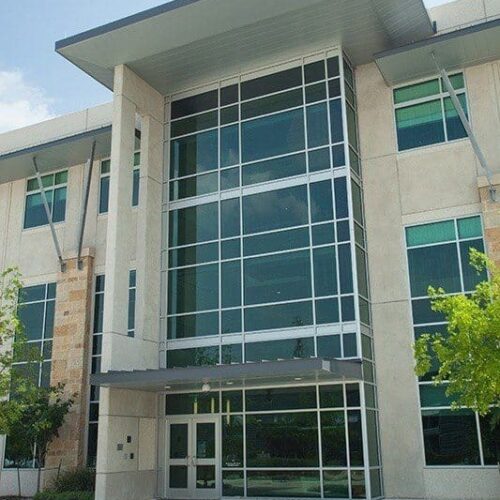 Exterior View of Curtain Wall System, Storefront Entrance Doors & Sunshades | LCRA Office Buildings | Commercial Projects | Anchor-Ventana Glass