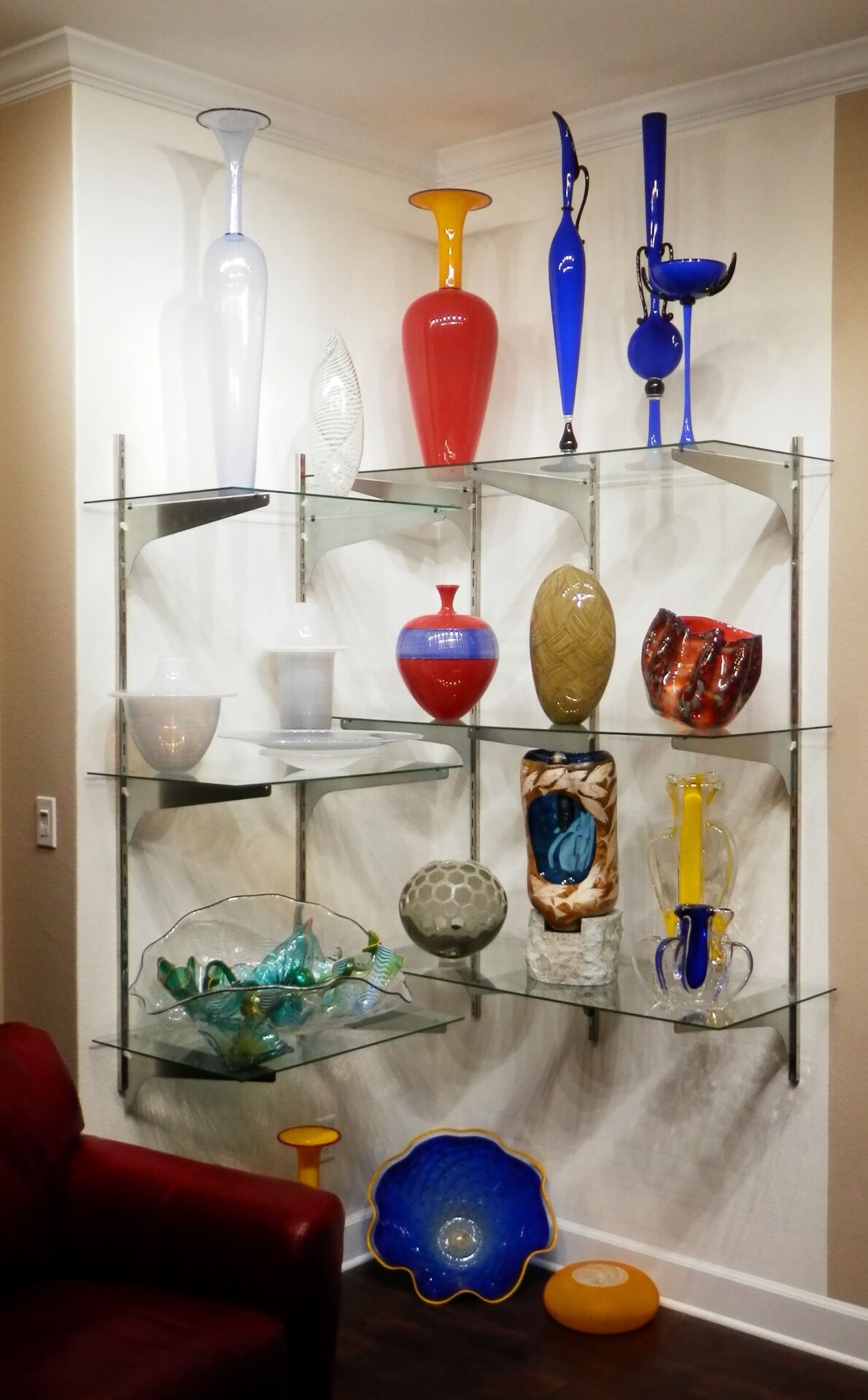 Glass shelves with decorative glass vases