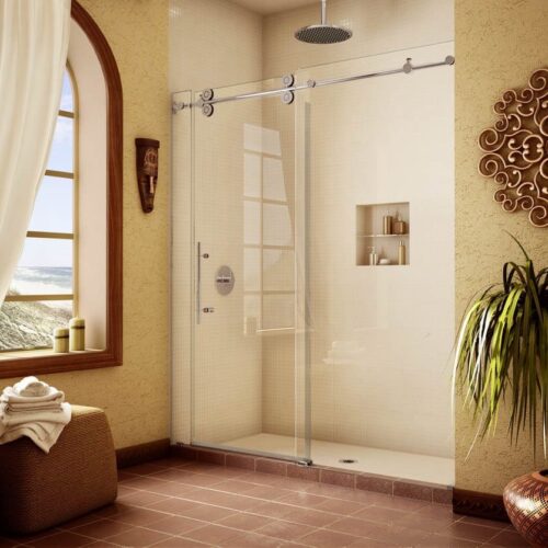 Sliding glass shower door in yellow bathroom