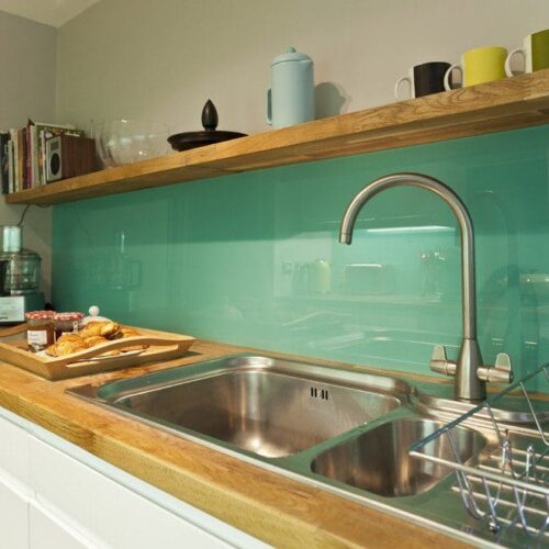 Teal Back Painted Glass Backsplash in Kitchen | Colored Glass Gallery | Residential Products | Anchor-Ventana Glass