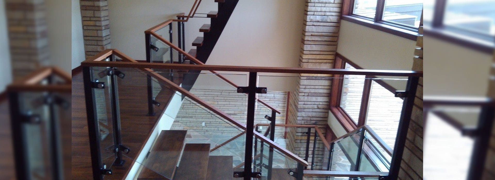 Commercial Building Interior with Glass Handrails for Staircase paired with Wood | Commercial Glass Handrail Products | Commercial Products | Anchor-Ventana Glass