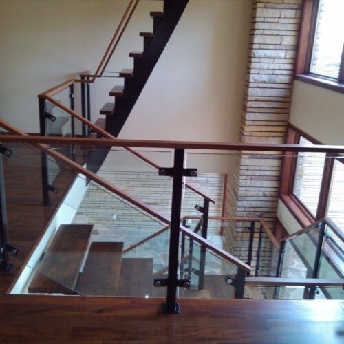 Commercial Building Interior with Glass Handrails for Staircase paired with Wood | Commercial Glass Handrails | Commercial Products | Anchor-Ventana Glass