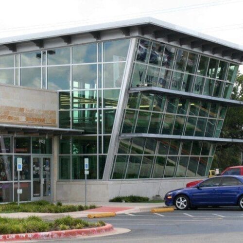 Custom Curtain Wall System that Angles Outward Toward Parking Lot | Curtain Walls | Multi-Story Buildings | Commercial Products Gallery | Anchor-Ventana Glass