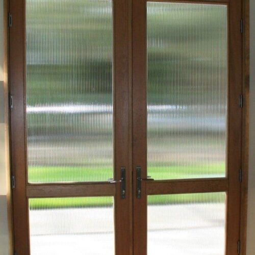 Reeded Glass Set in Wood Entry Doors | Entrances Gallery | Commercial Products | Anchor-Ventana Glass