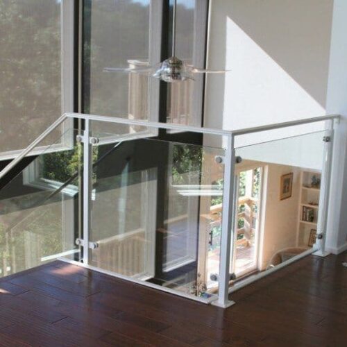 Custom Glass Handrail with Standoff System in Stairway | Glass Handrail Systems | Residential Gallery | Anchor-Ventana Glass