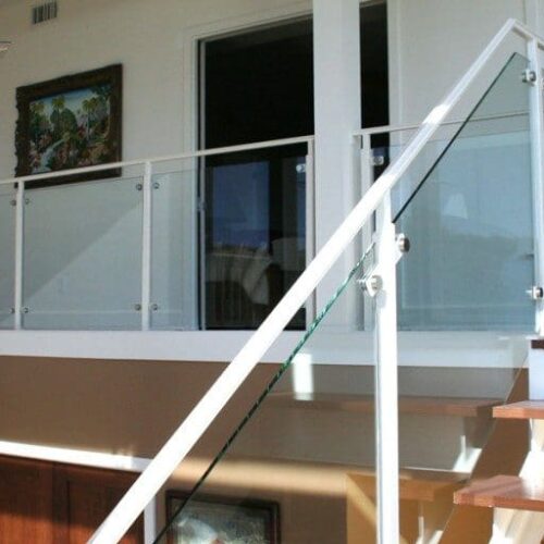 Clear Glass Handrail with Standoff Caps in Stairway & Landing | Glass Handrail Systems | Residential Gallery | Anchor-Ventana Glass