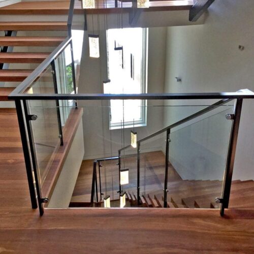 Interior Glass Handrail System on Winding Staircase | Glass Handrail Systems | Residential Gallery | Anchor-Ventana Glass