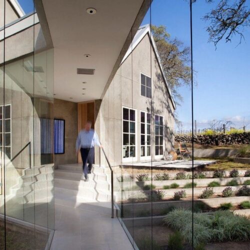 Butt Glazed Walls & Handrail at Entry | Glass Wall Systems Gallery | Residential Products | Anchor-Ventana Glass