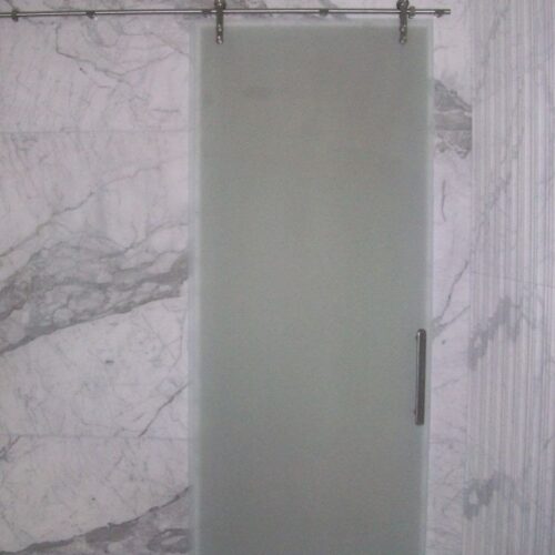 Manet Sliding Barn Style Shower Door with Saten Glass in Bathroom | Glass Wall Systems Gallery | Residential Products | Anchor-Ventana Glass