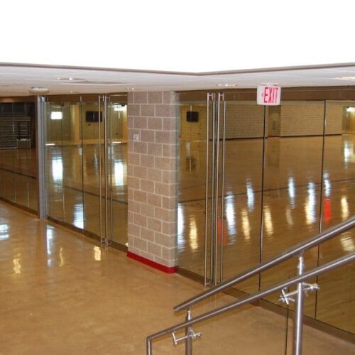 Interior View of Glass Wall System & Glass Handrails | Round Rock Sports Center | Commercial Projects | Anchor-Ventana