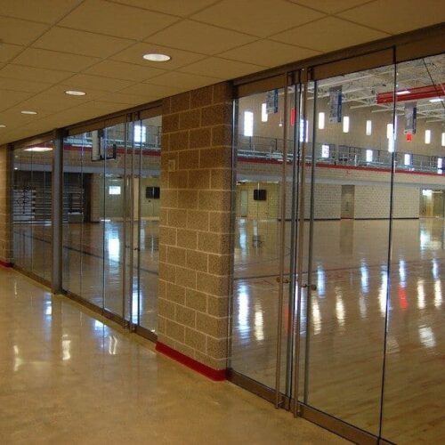 Interior View of Glass Wall System & Heavy Glass Doors | Round Rock Sports Center | Commercial Projects | Anchor-Ventana