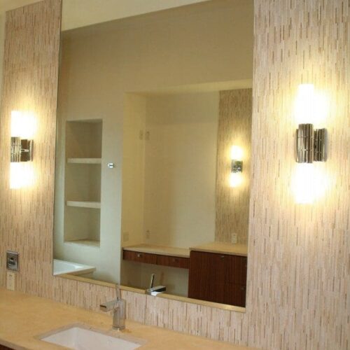 Frameless Mirror Set with J-mold at Bottom in Bathroom | Mirrors Gallery | Anchor-Ventana Glass