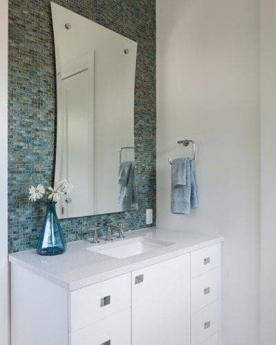 Hour Glass Beveled Mirror Set with Standoff Caps in Bathroom | Mirrors Gallery | Anchor-Ventana Glass