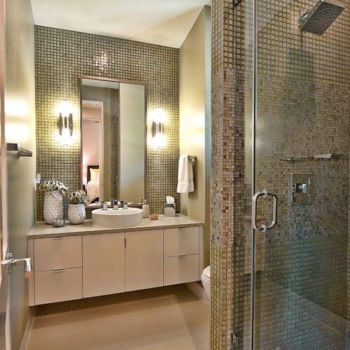 Vanity Mirror with J-mold on All Sides and Frameless Shower Enclosure in Bathroom | Mirrors Gallery | Anchor-Ventana Glass