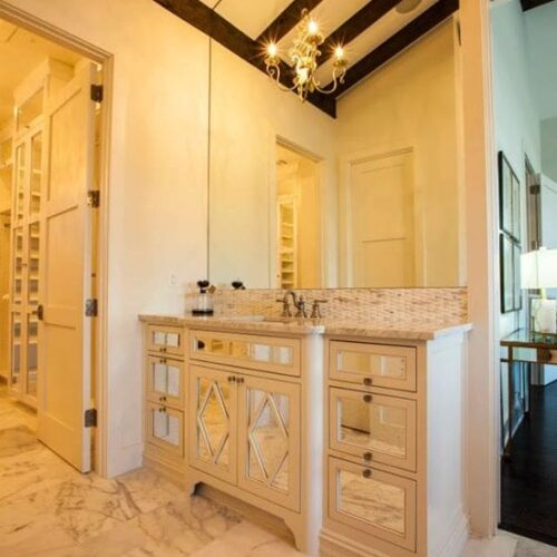 Vanity with Frameless Antique Mirrors in Cabinet Front and Mirror Above in Bathroom | Mirrors Gallery | Anchor-Ventana Glass