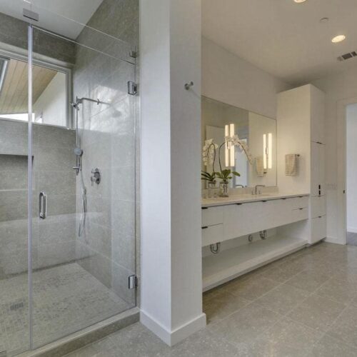 Frameless Inline Shower and Frameless Mirror in Bathroom | Mirrors Gallery | Anchor-Ventana Glass