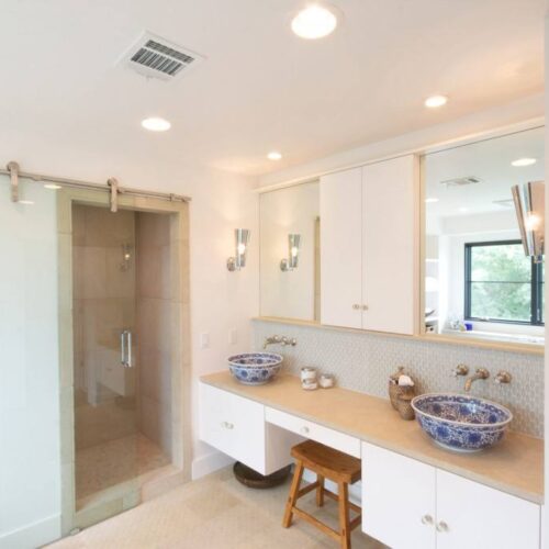 Frameless Dorma Manet Sliding Barn Door at Shower in Bathroom | Shower Gallery | Anchor-Ventana Glass