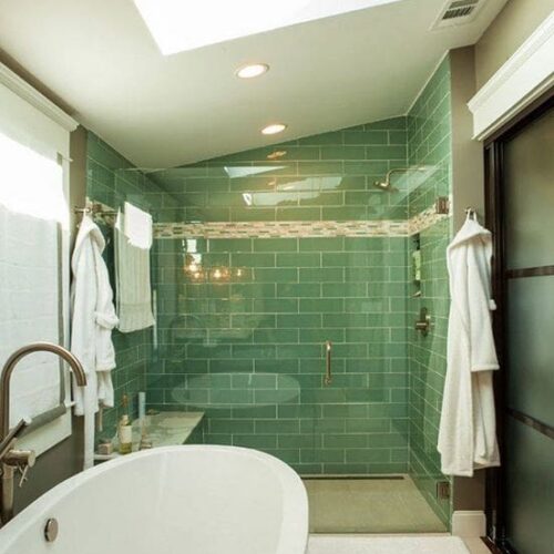 Frameless Shower Enclosure with Channel Buried in Tile at Fixed Panel in Bathroom | Shower Gallery | Anchor-Ventana Glass