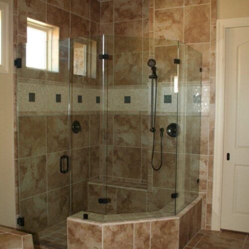 Frameless Neo Shower Enclosure with Clamps on Fixed Panels in Bathroom Shower | Shower Gallery | Anchor-Ventana Glass