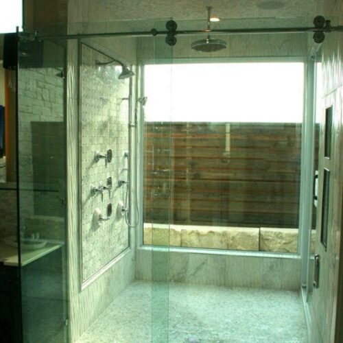 Frameless Sliding Shower Enclosure in Bathroom Framed with Glass Window | Sliding Shower Enclosures Gallery | Residential Products | Anchor-Ventana Glass