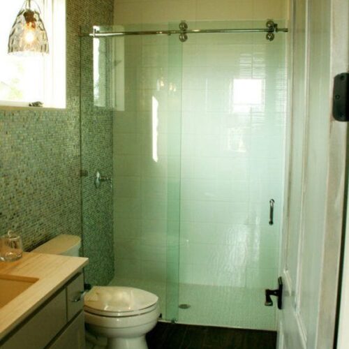 Simple Frameless Sliding Shower Enclosure in Bathroom | Sliding Shower Enclosures Gallery | Residential Products | Anchor-Ventana Glass