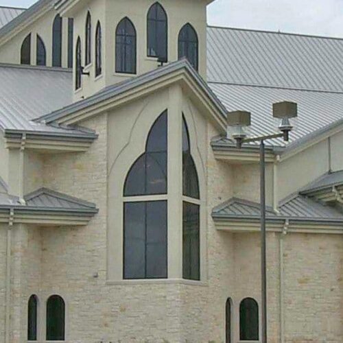 Exterior View of Custom Church Windows as Storefront | Commercial Storefronts | Commercial Products | Anchor-Ventana Glass